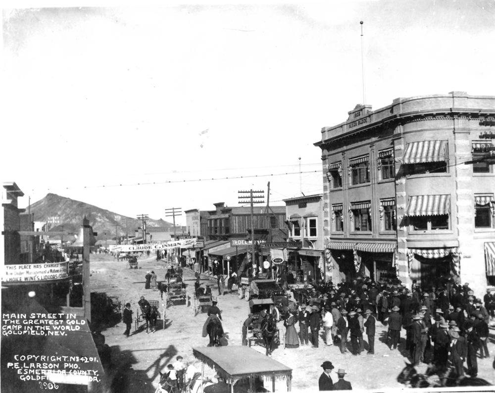 Goldfield, NV. Notice the "Claude C. Inman for constable" banner over the street.