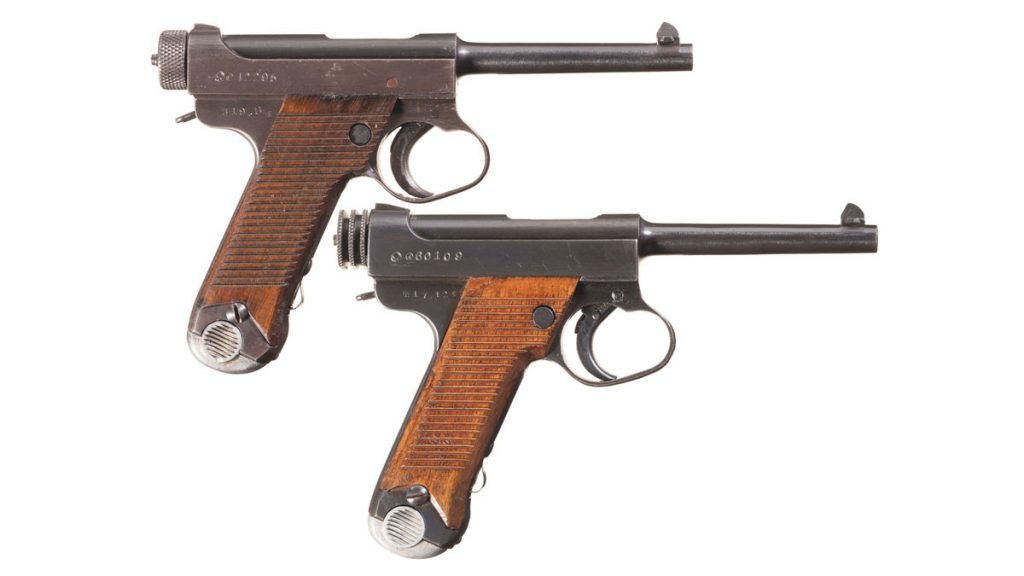 Two Japanese Type 14 Semi-Automatic Pistols with Holsters. 